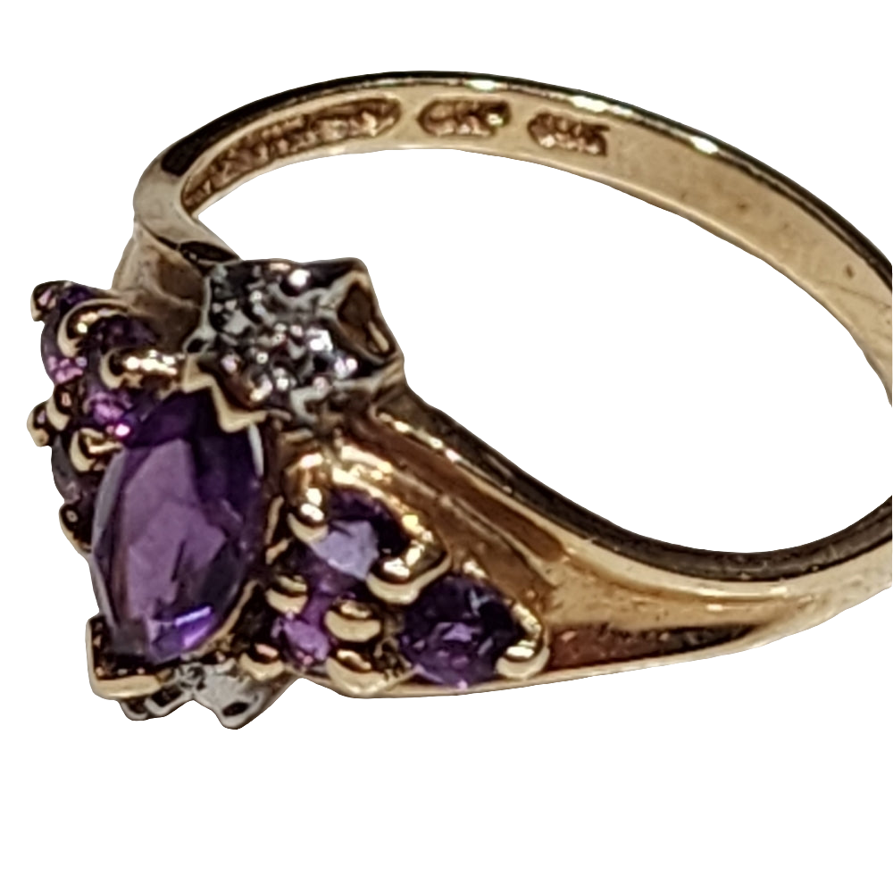 10K gold ring with purple stones and diamonds size 7 invest in gold jewelry