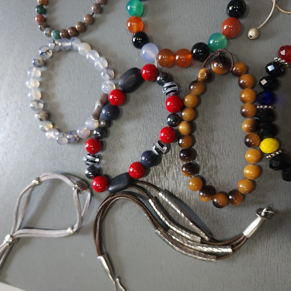 Costume fashion jewelry lot of bracelets mostly stretch some charms