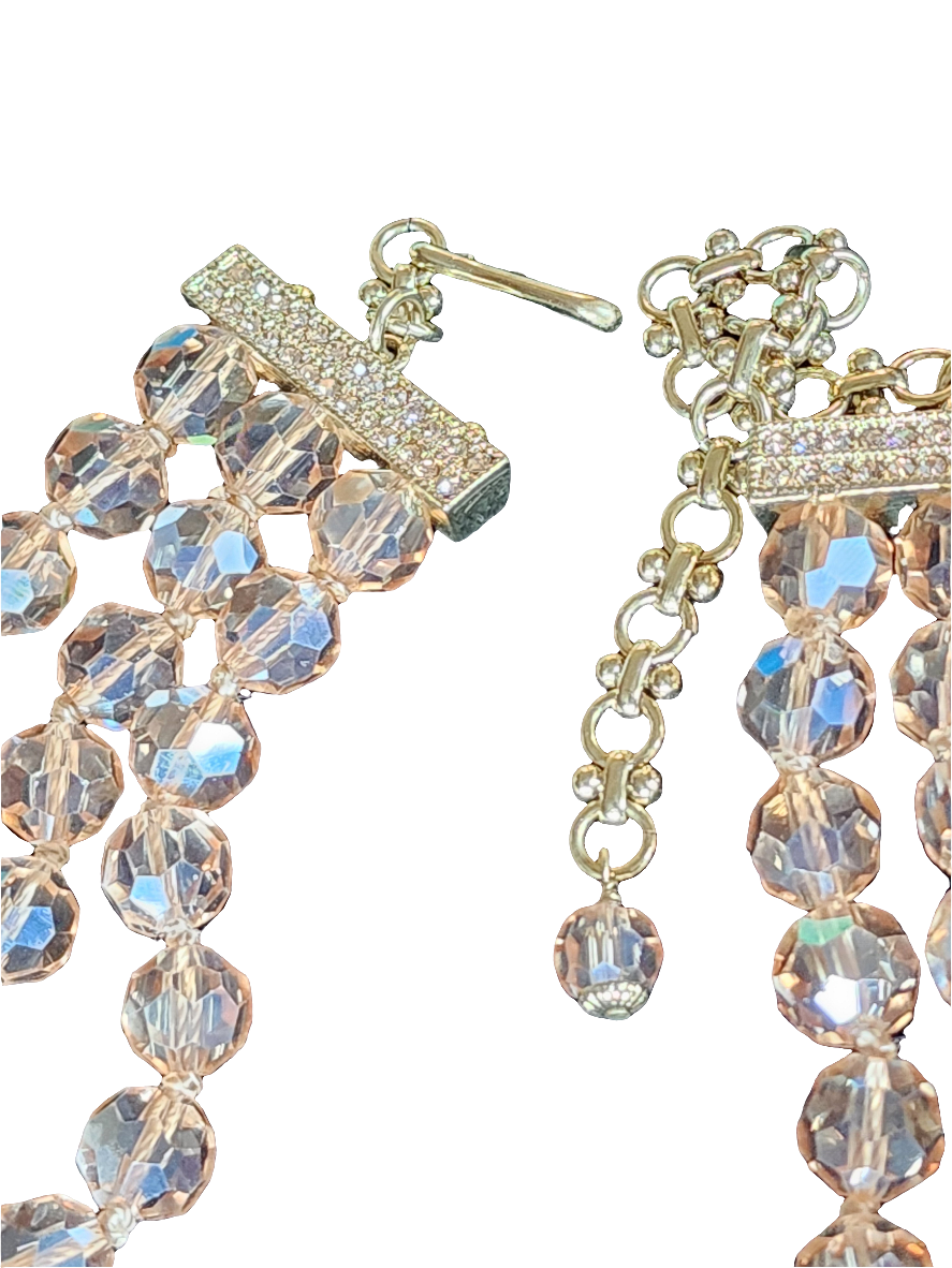 Heidi Daus golden crystals three strand necklace and clip on earrings set