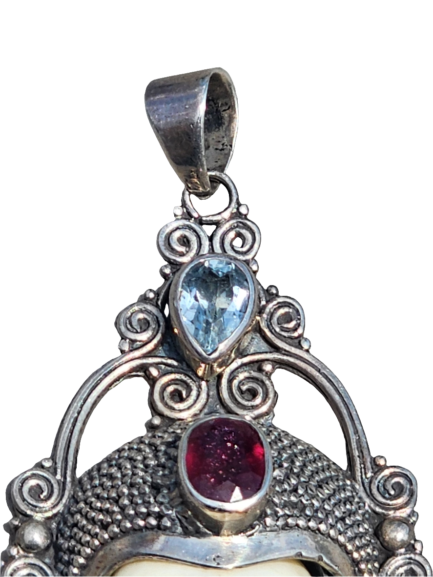 Sterling Silver Sajen Style face pendant with gemstones