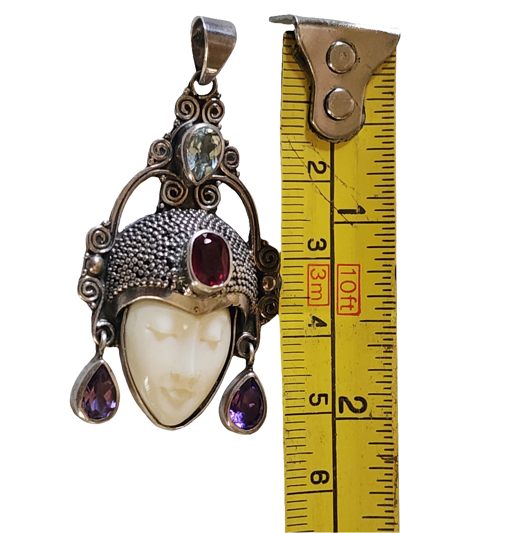 Sterling Silver Sajen Style face pendant with gemstones