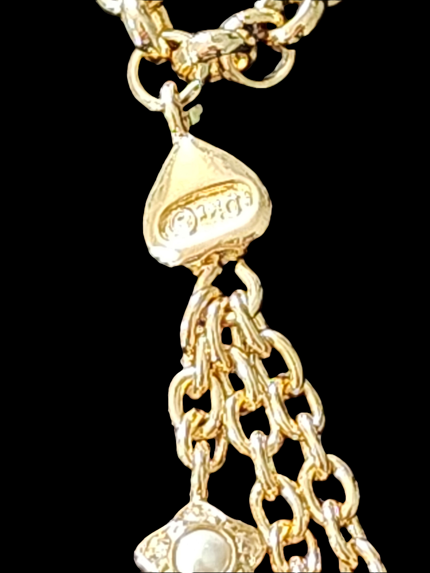 Christian Dior gold tone bracelet with dangling charms heart star moon