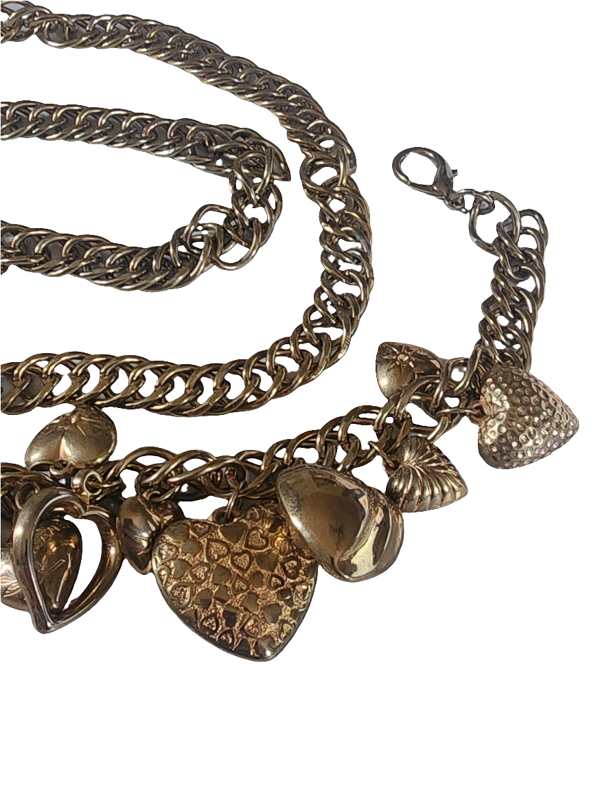 Dangle puffy  heart gold tone belt