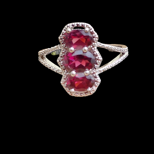 Sterling silver ring with purplish pink Stones size 8 fine jewelry