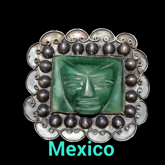 Vintage sterling silver Mexican cuff bracelet green Aztec face jewelry Mexico