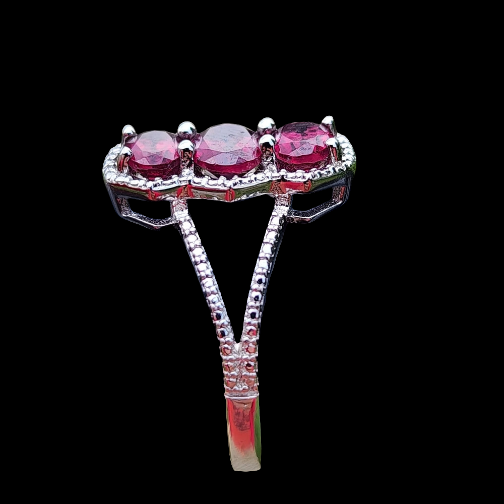 Sterling silver ring with purplish pink Stones size 8 fine jewelry