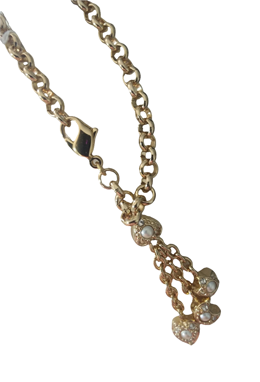 Christian Dior gold tone bracelet with dangling charms heart star moon