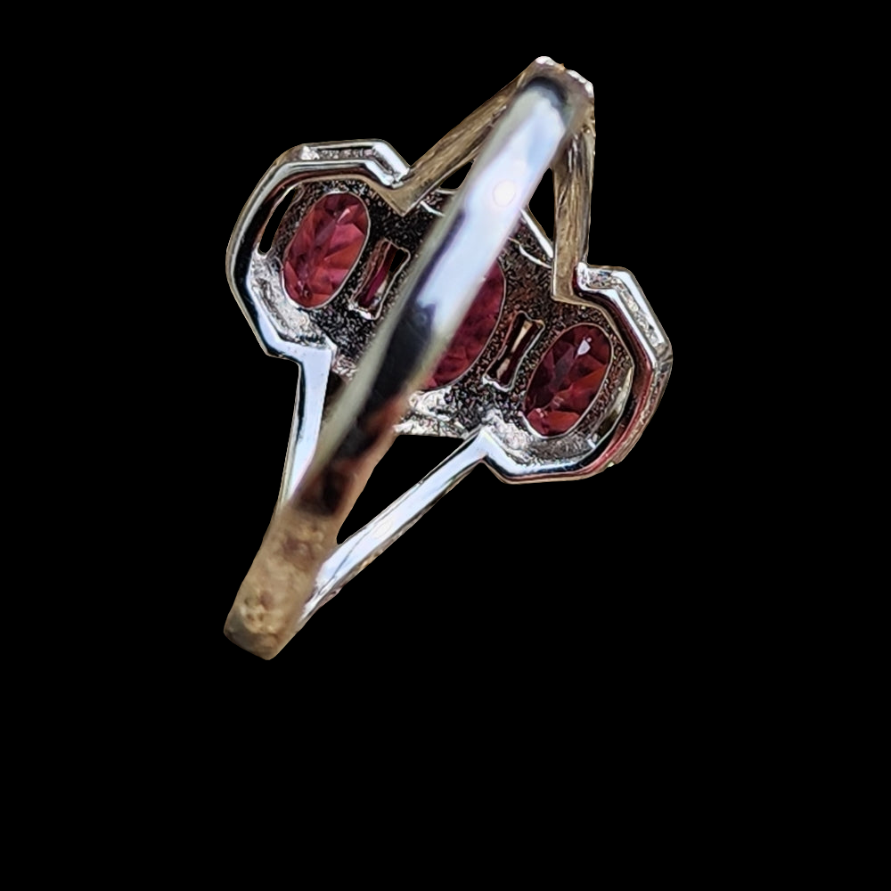 Sterling silver ring with purplish pink Stones size 8 fine jewelry