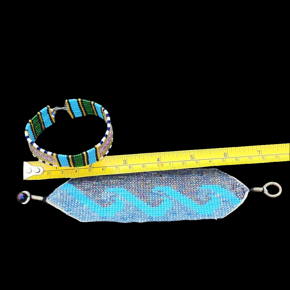 A lot of handmade beadwork jewelry one pair of earrings 2 bracelets