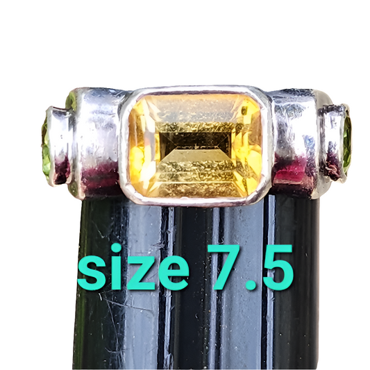Sterling silver ring size 7.5 yellow green stones