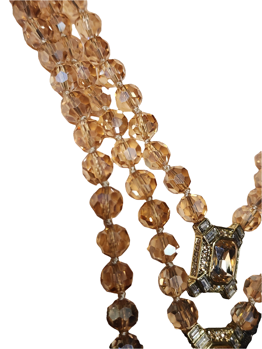 Heidi Daus golden crystals three strand necklace and clip on earrings set