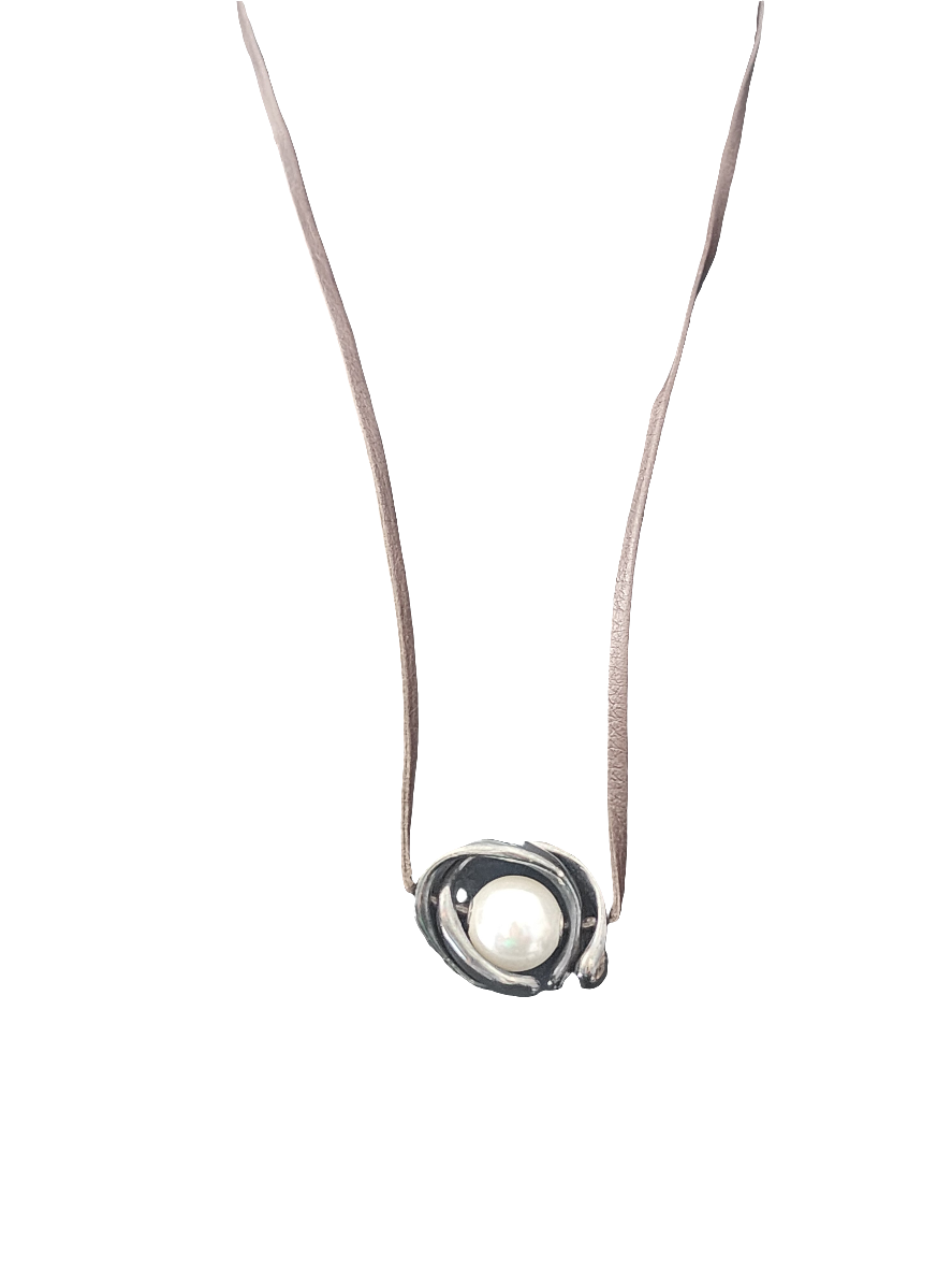 Uno de 50 mid century style pendant on leather cord is faux pearl unisex