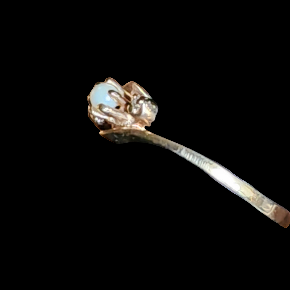 You're getting a pearl and diamond ring size 6.5 10K Plumb gold