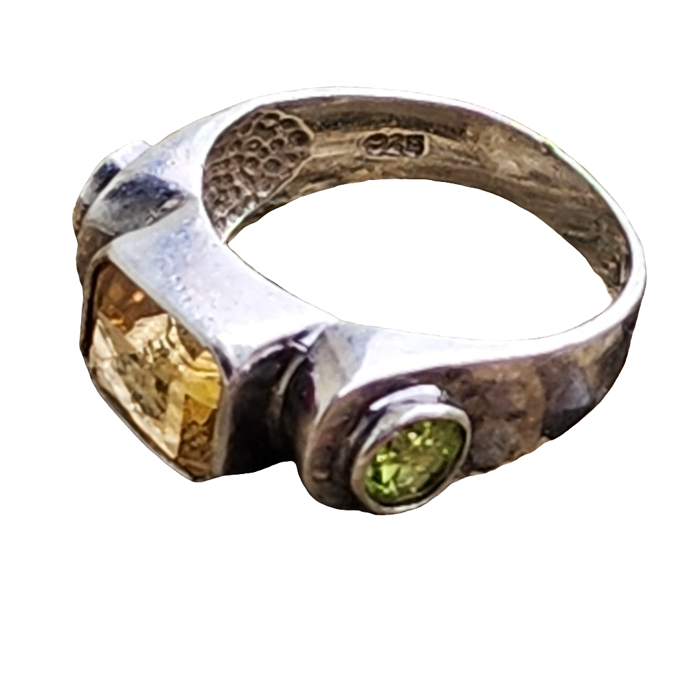 Sterling silver ring size 7.5 yellow green stones