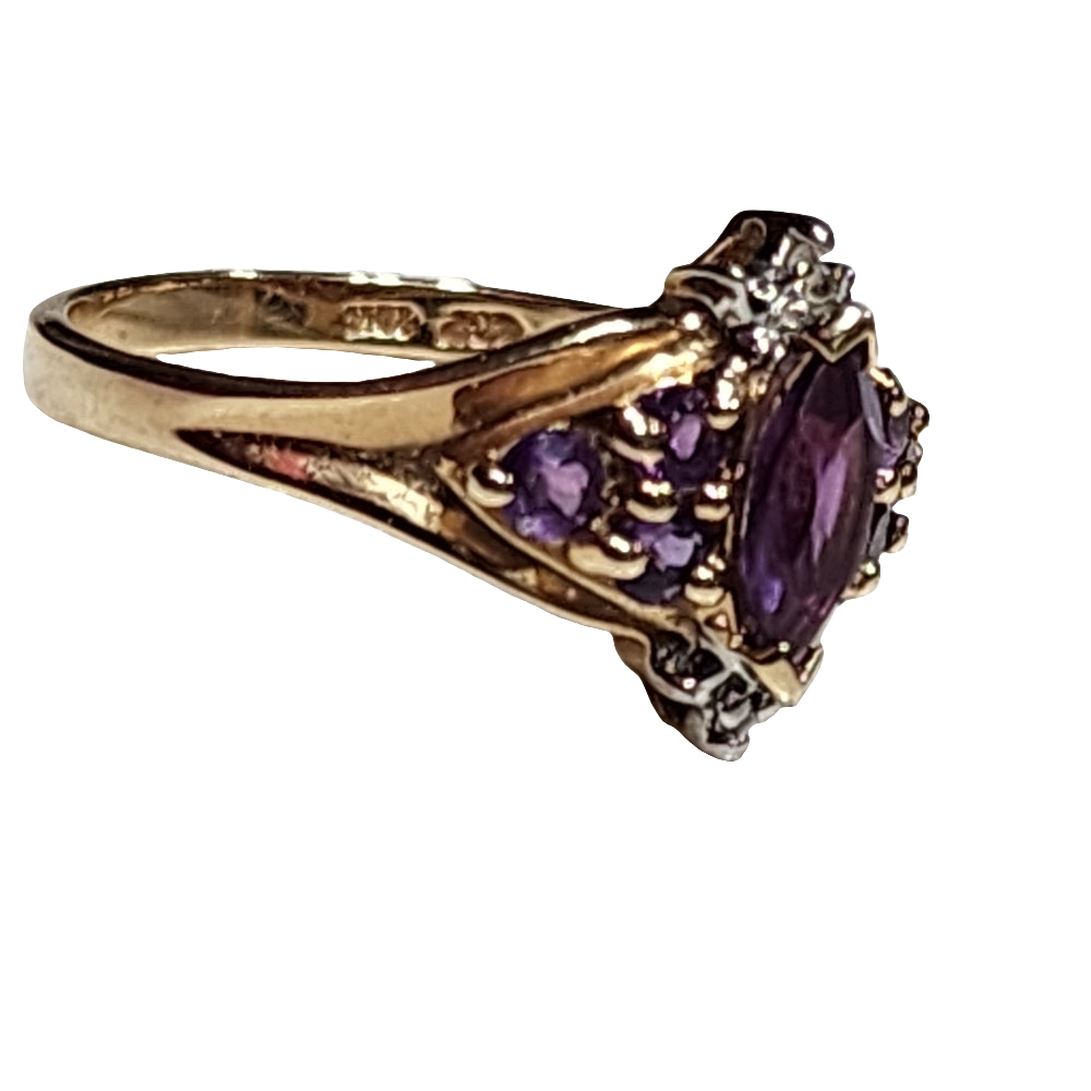 10K gold ring with purple stones and diamonds size 7 invest in gold jewelry