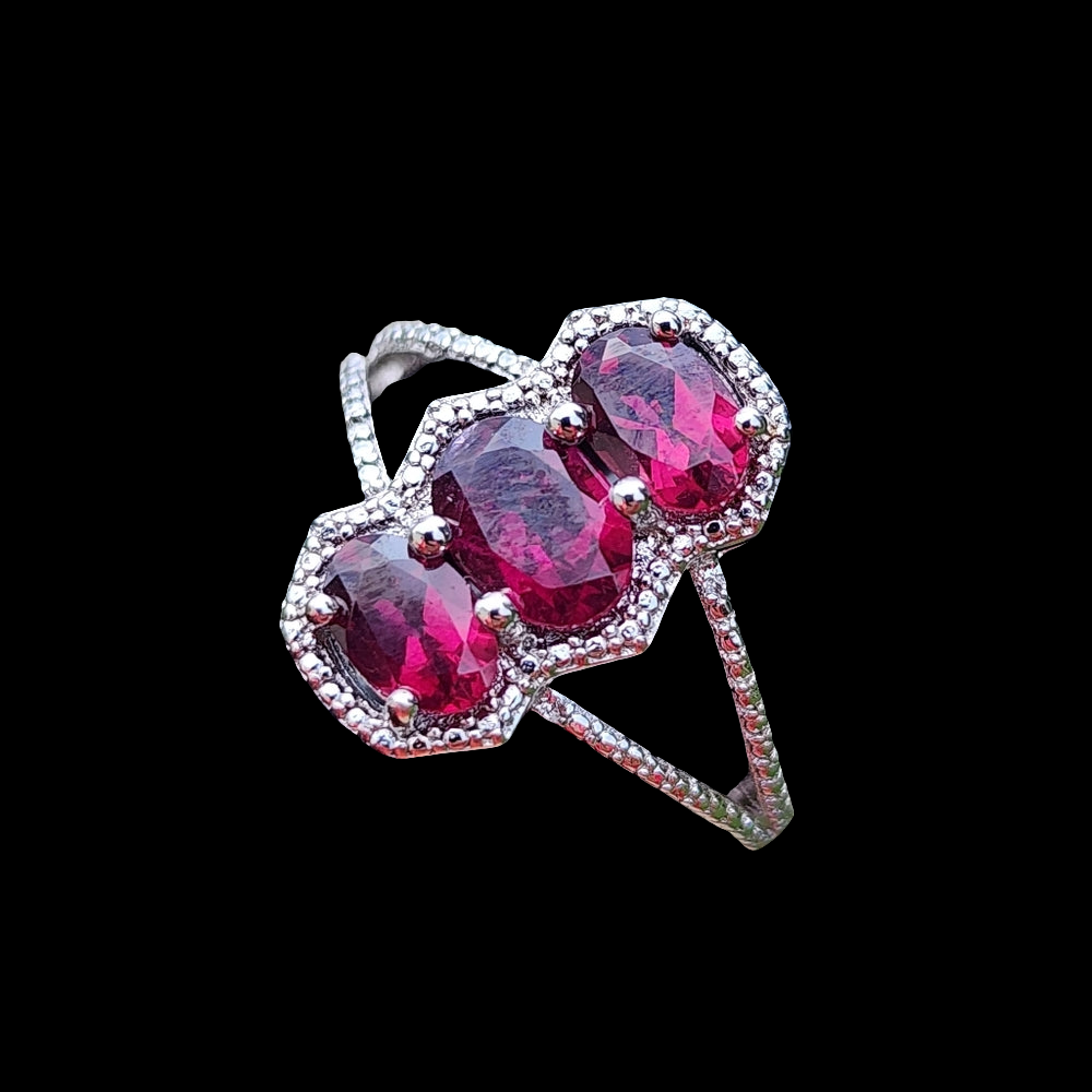 Sterling silver ring with purplish pink Stones size 8 fine jewelry