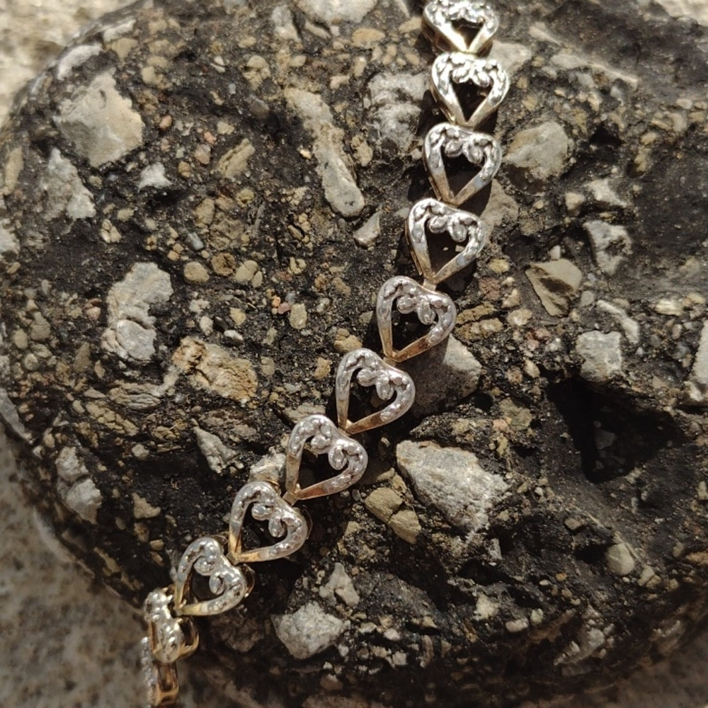 Sterling silver 925 heart bracelet with gold accents 7.75in
