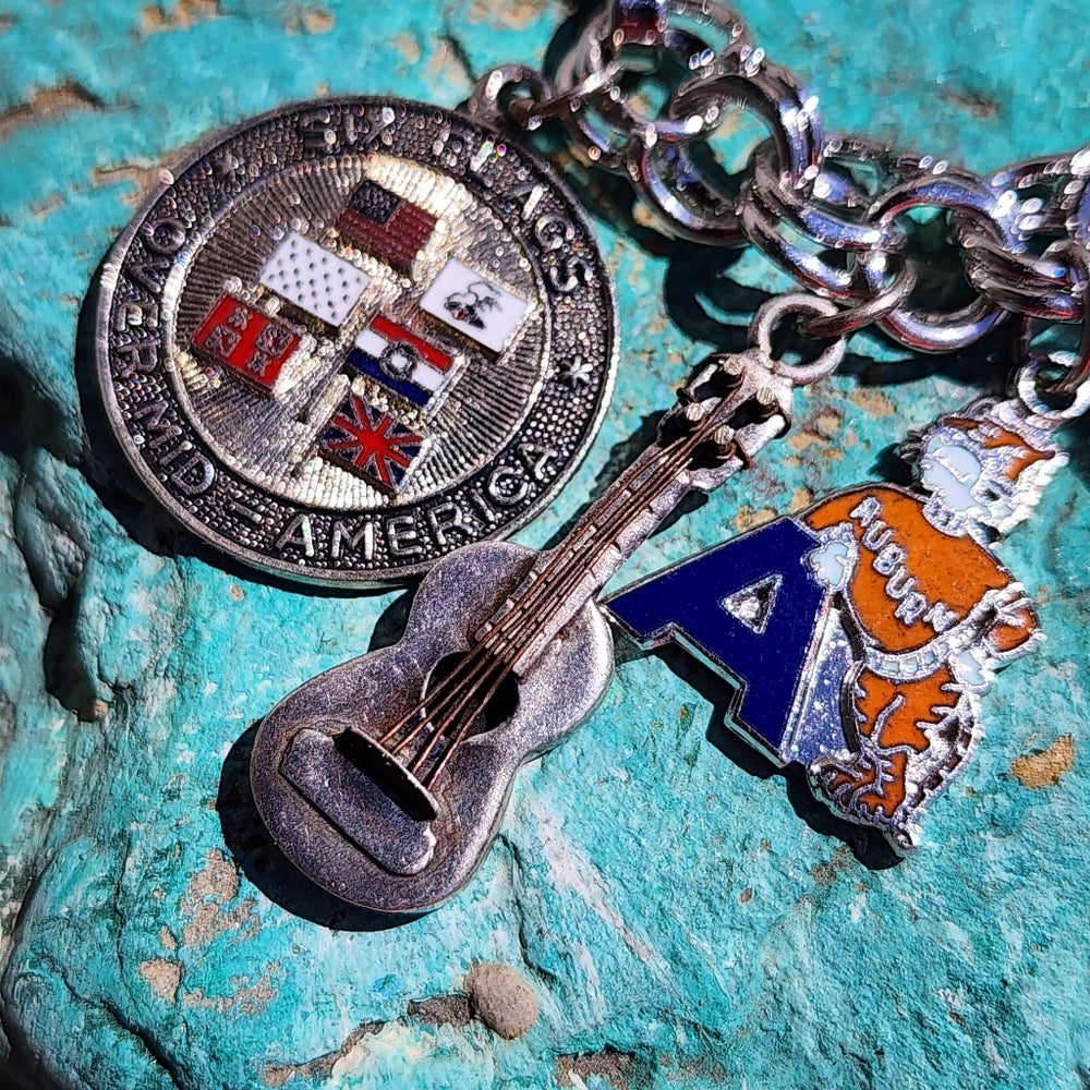 Monet bracelet with sterling silver charms Mickey Mouse guitar Stein Odd Fellows