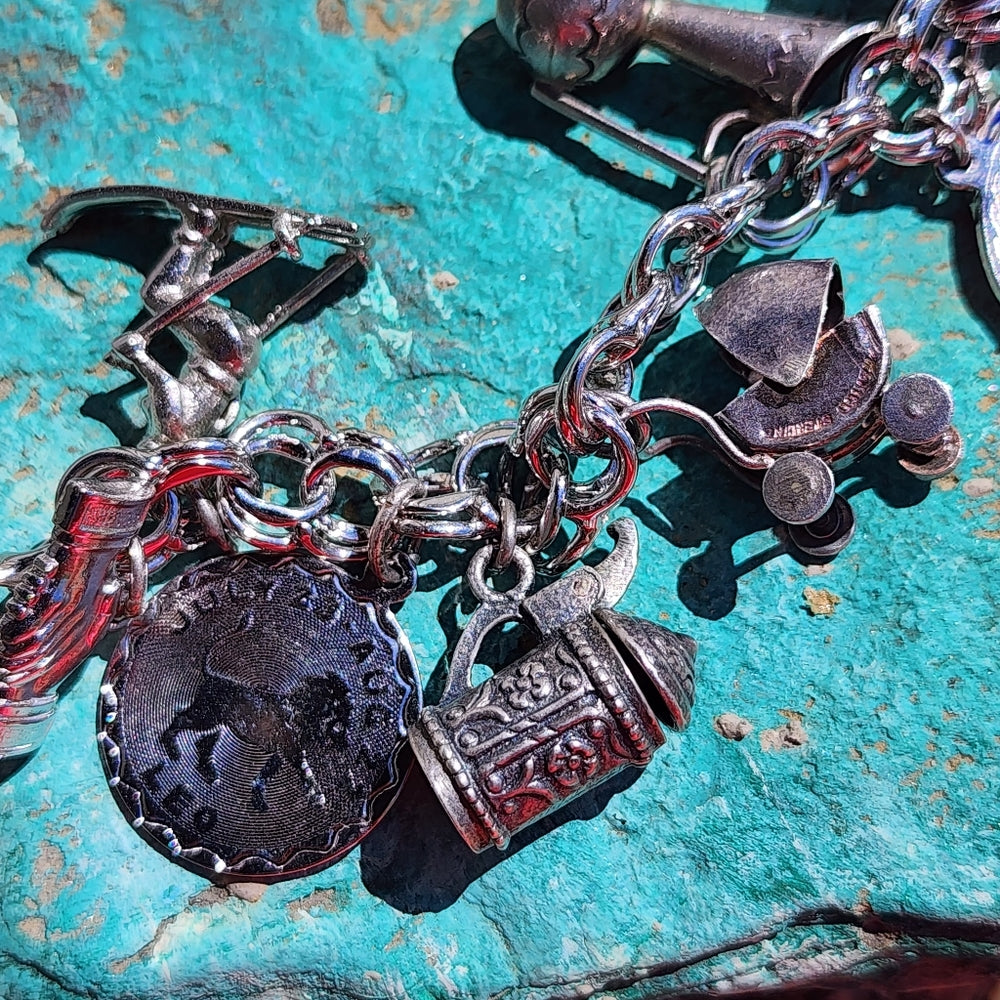 Monet bracelet with sterling silver charms Mickey Mouse guitar Stein Odd Fellows