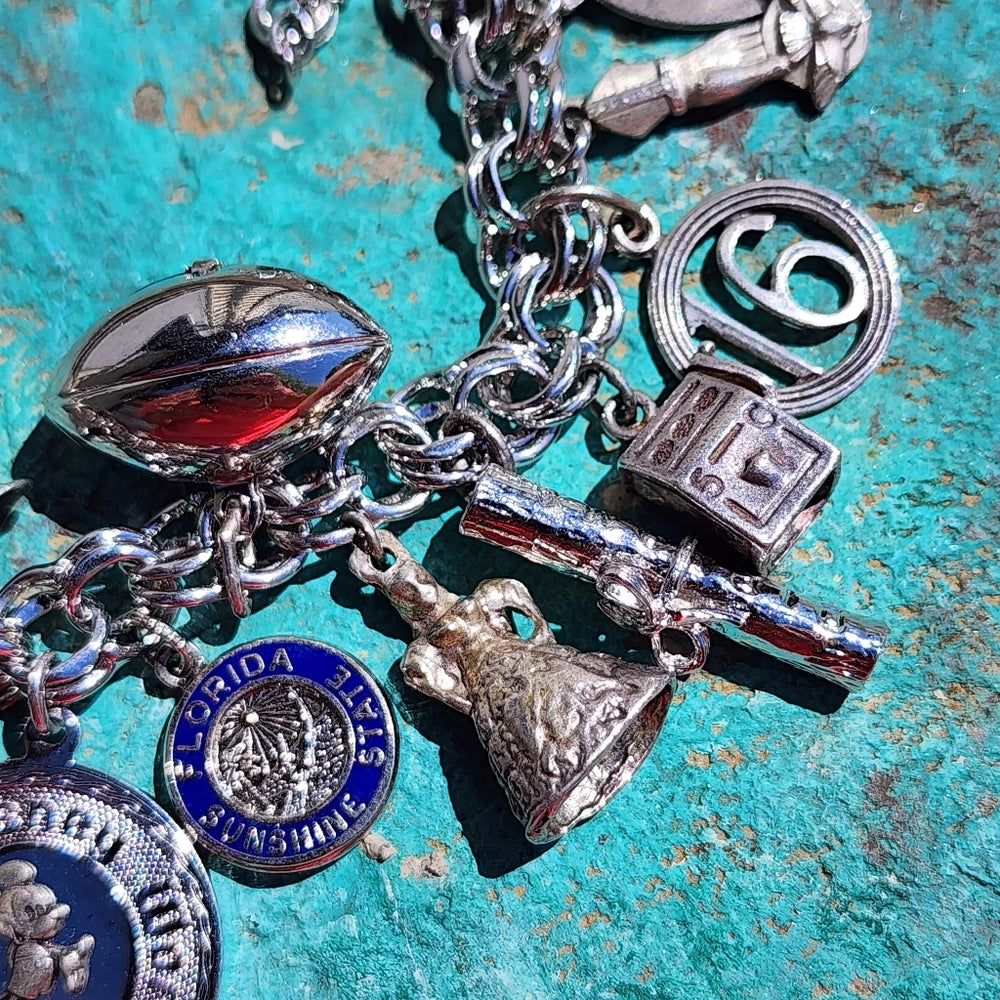 Monet bracelet with sterling silver charms Mickey Mouse guitar Stein Odd Fellows