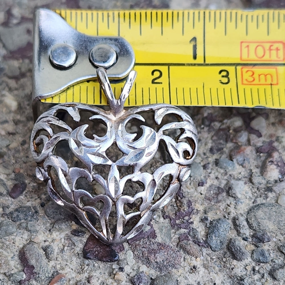 Vintage Avon sterling silver filigree open work heart pendant