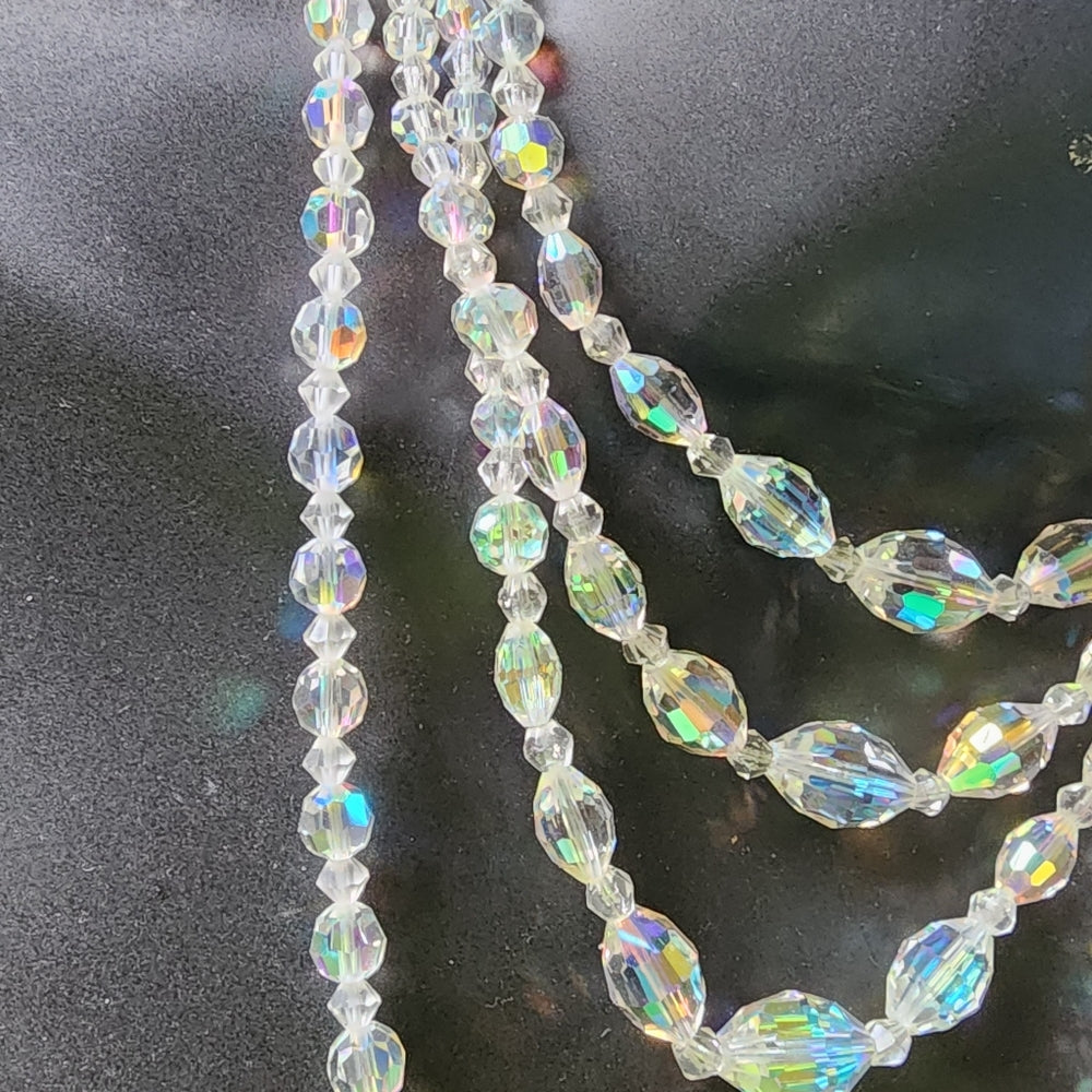 Lot of two Aurora Borealis glass bead necklaces three strand & 1 strand