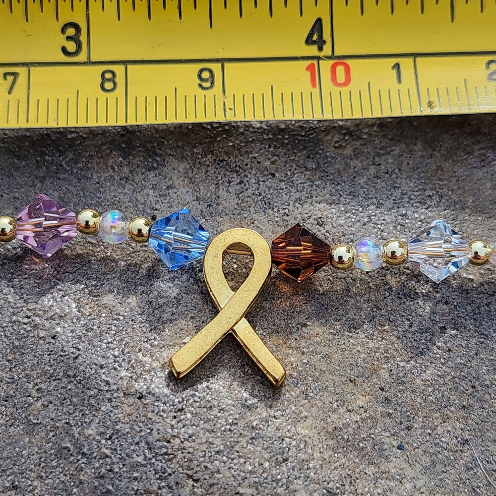 Jewelry cancer awareness bracelet with meaning of colors