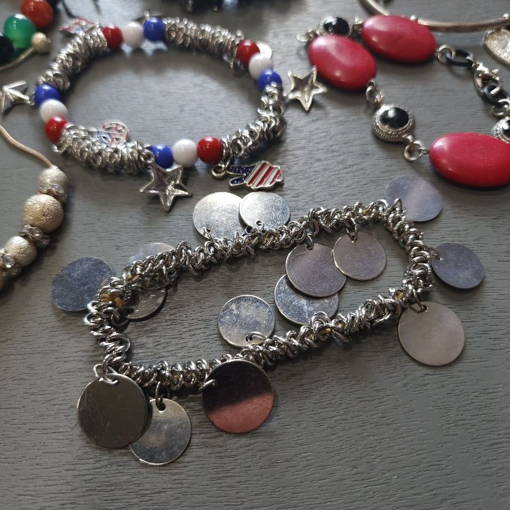 Costume fashion jewelry lot of bracelets mostly stretch some charms