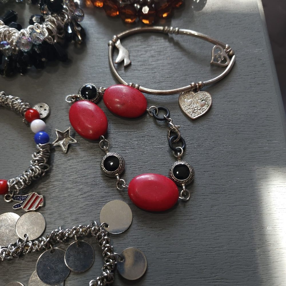 Costume fashion jewelry lot of bracelets mostly stretch some charms