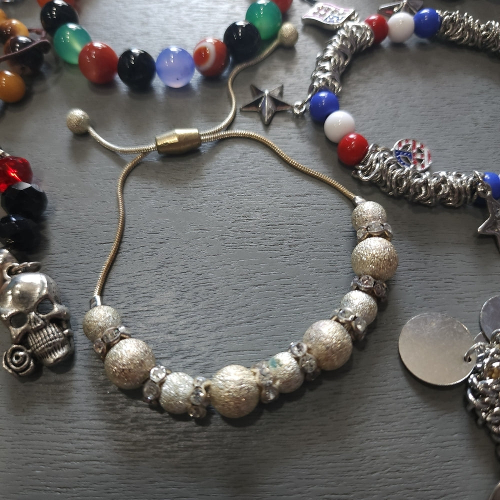 Costume fashion jewelry lot of bracelets mostly stretch some charms