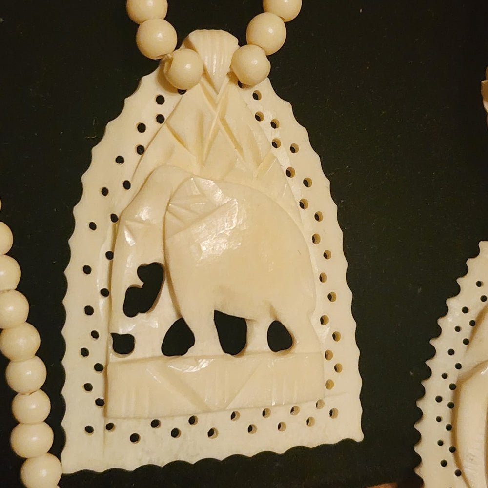 Organic costume jewelry lot 2 carved necklaces elephant and scarab bone ?