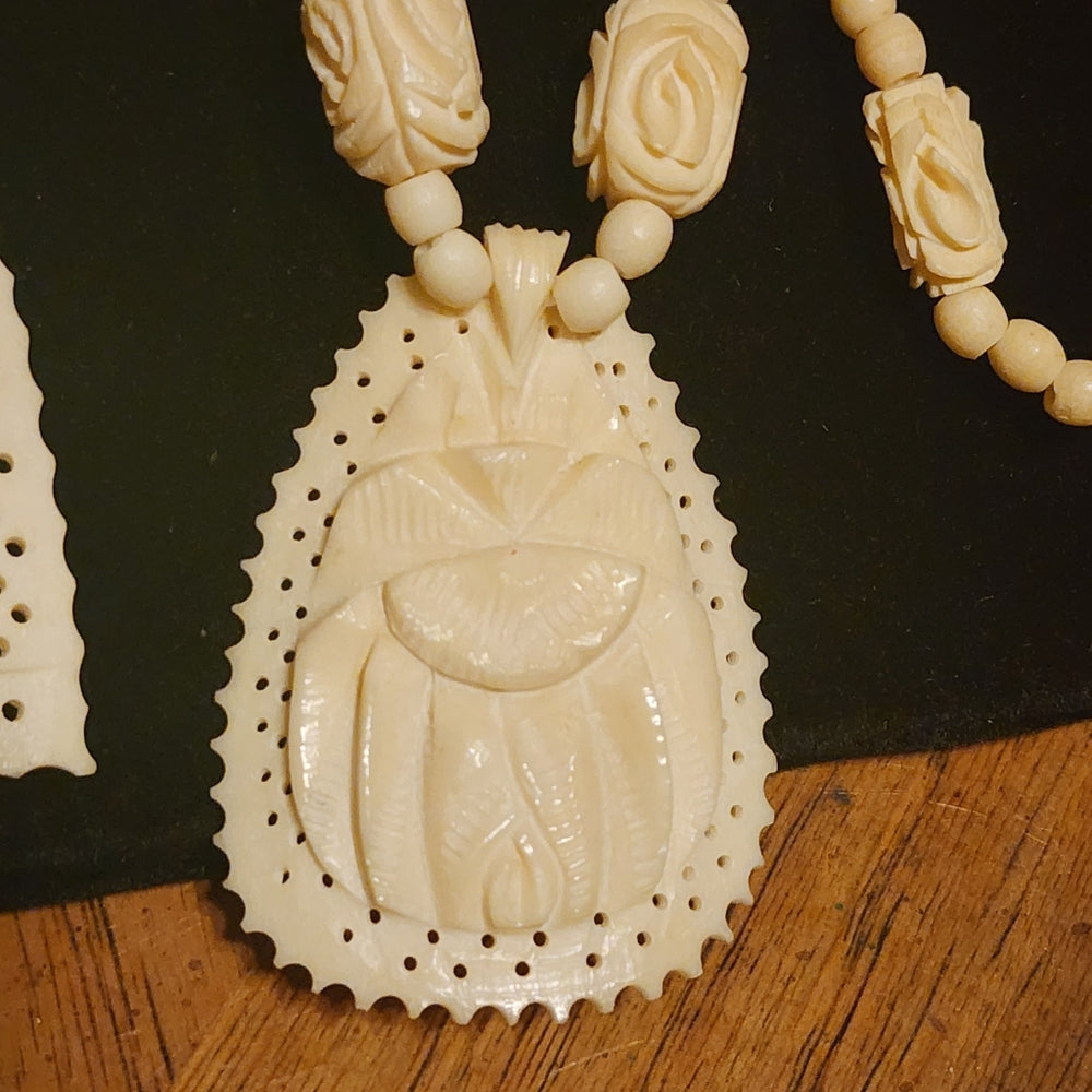 Organic costume jewelry lot 2 carved necklaces elephant and scarab bone ?