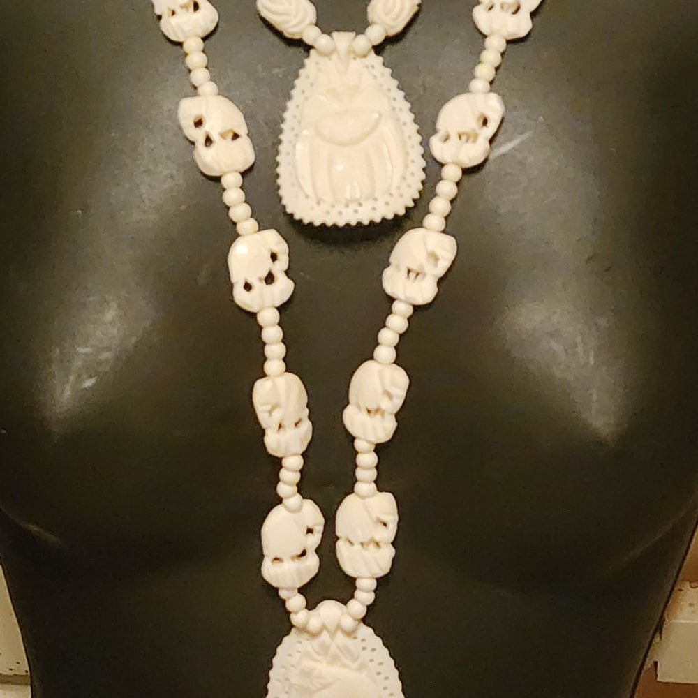 Organic costume jewelry lot 2 carved necklaces elephant and scarab bone ?