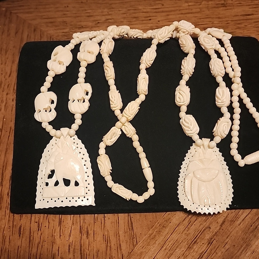 Organic costume jewelry lot 2 carved necklaces elephant and scarab bone ?