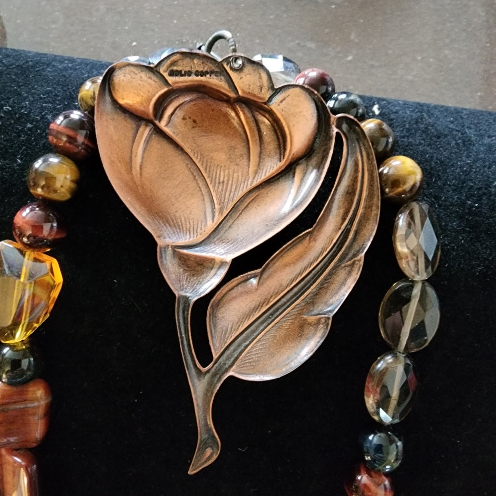 Two piece jewelry lot glass and tiger's eye necklace big copper flower pendant