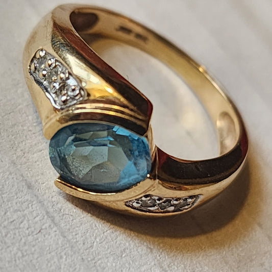 10k  yellow gold blue topaz and diamond ring size 8 great investment