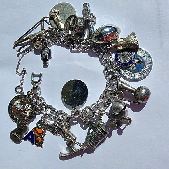 Monet bracelet with sterling silver charms Mickey Mouse guitar Stein Odd Fellows