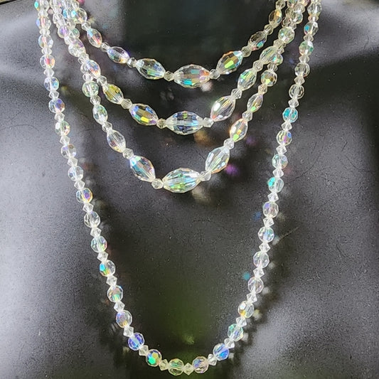 Lot of two Aurora Borealis glass bead necklaces three strand & 1 strand