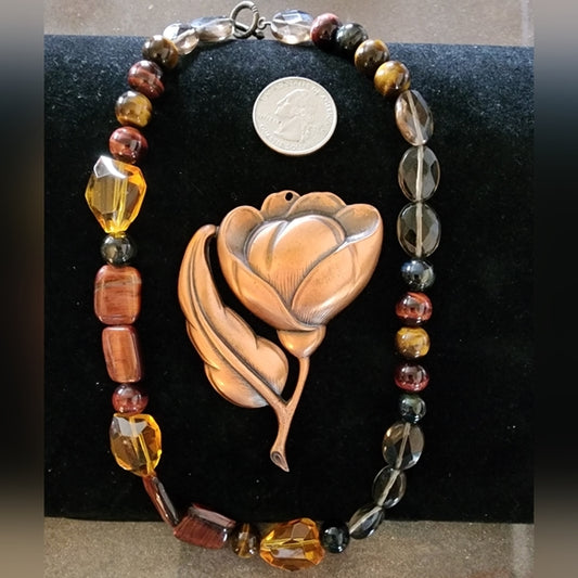 Two piece jewelry lot glass and tiger's eye necklace big copper flower pendant
