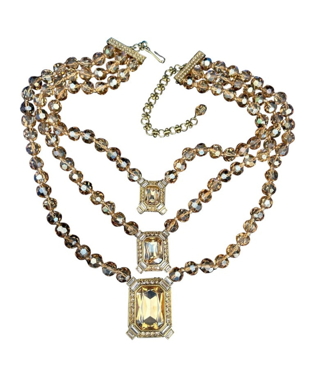 Heidi Daus golden crystals three strand necklace and clip on earrings set