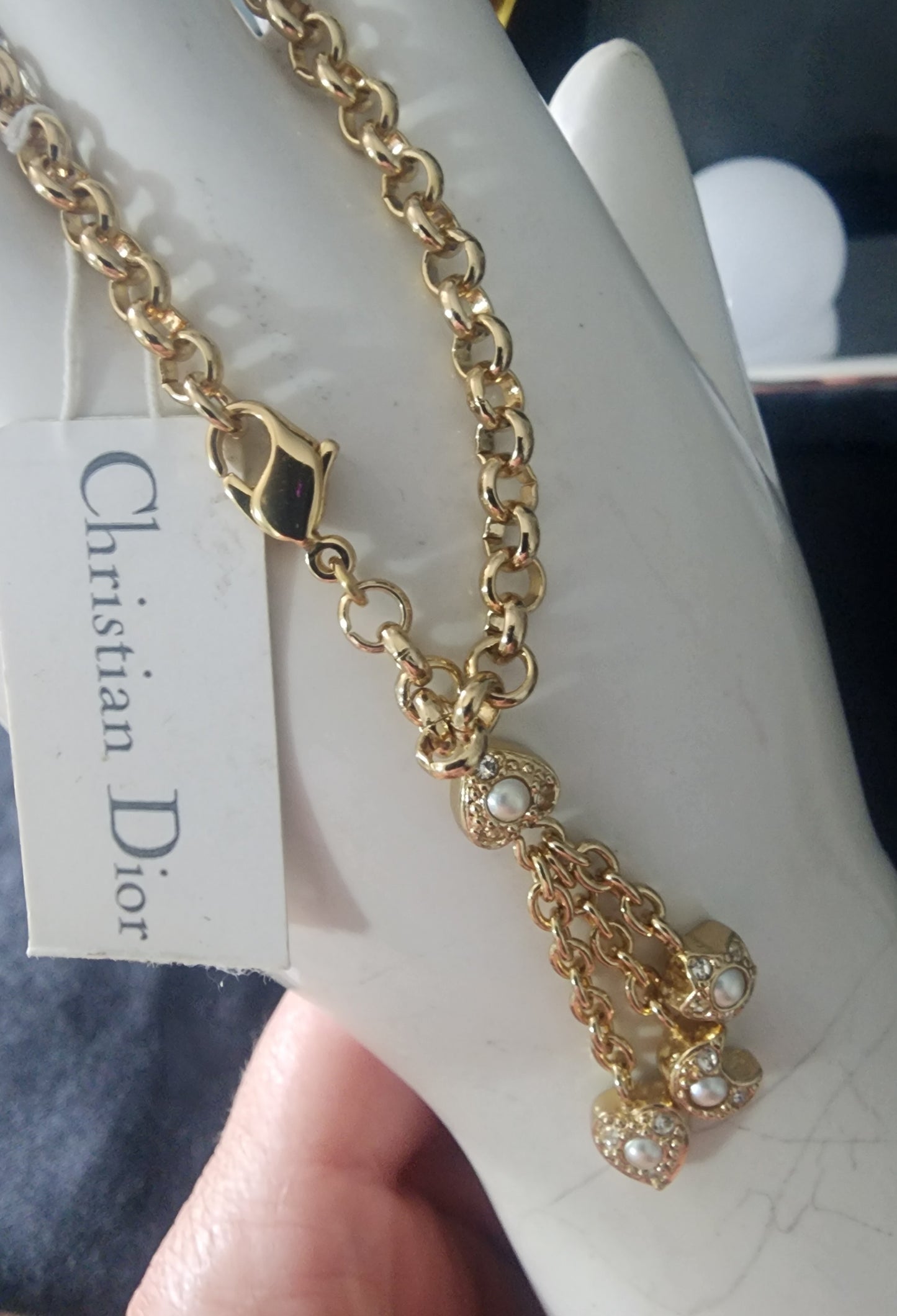 Christian Dior gold tone bracelet with dangling charms heart star moon