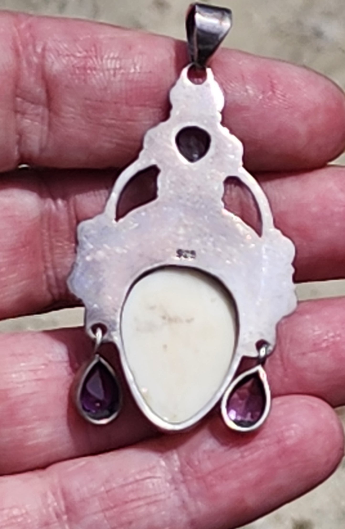 Sterling Silver Sajen Style face pendant with gemstones