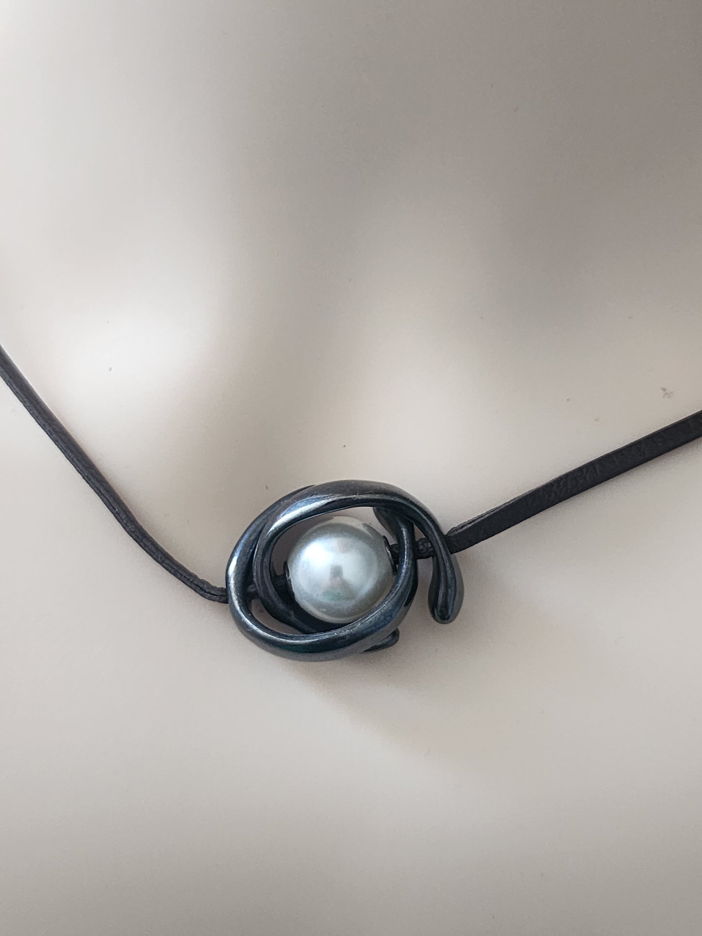 Uno de 50 mid century style pendant on leather cord is faux pearl unisex